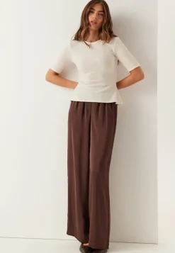 BUBBLEROOM Knitted Peplum Top