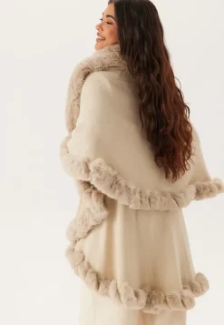 Hollies Wednesday Cape